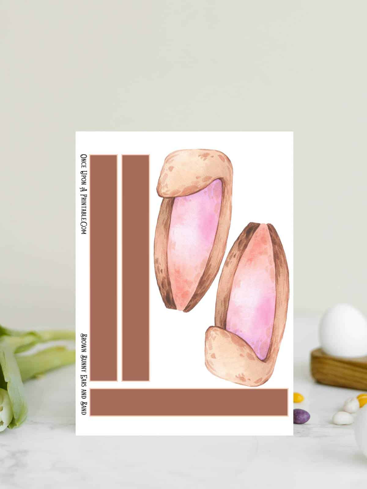 Easter bunny ears with brown and pink to craft with kids as a headband.