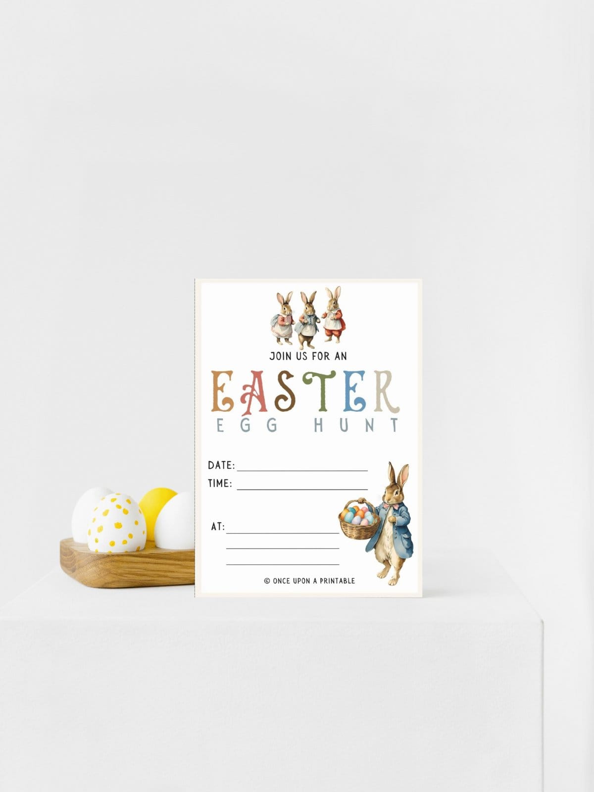 Peter, Flopsy, Mopsy, and Cottontail bunny rabbits on an Easter egg hunt invitation.