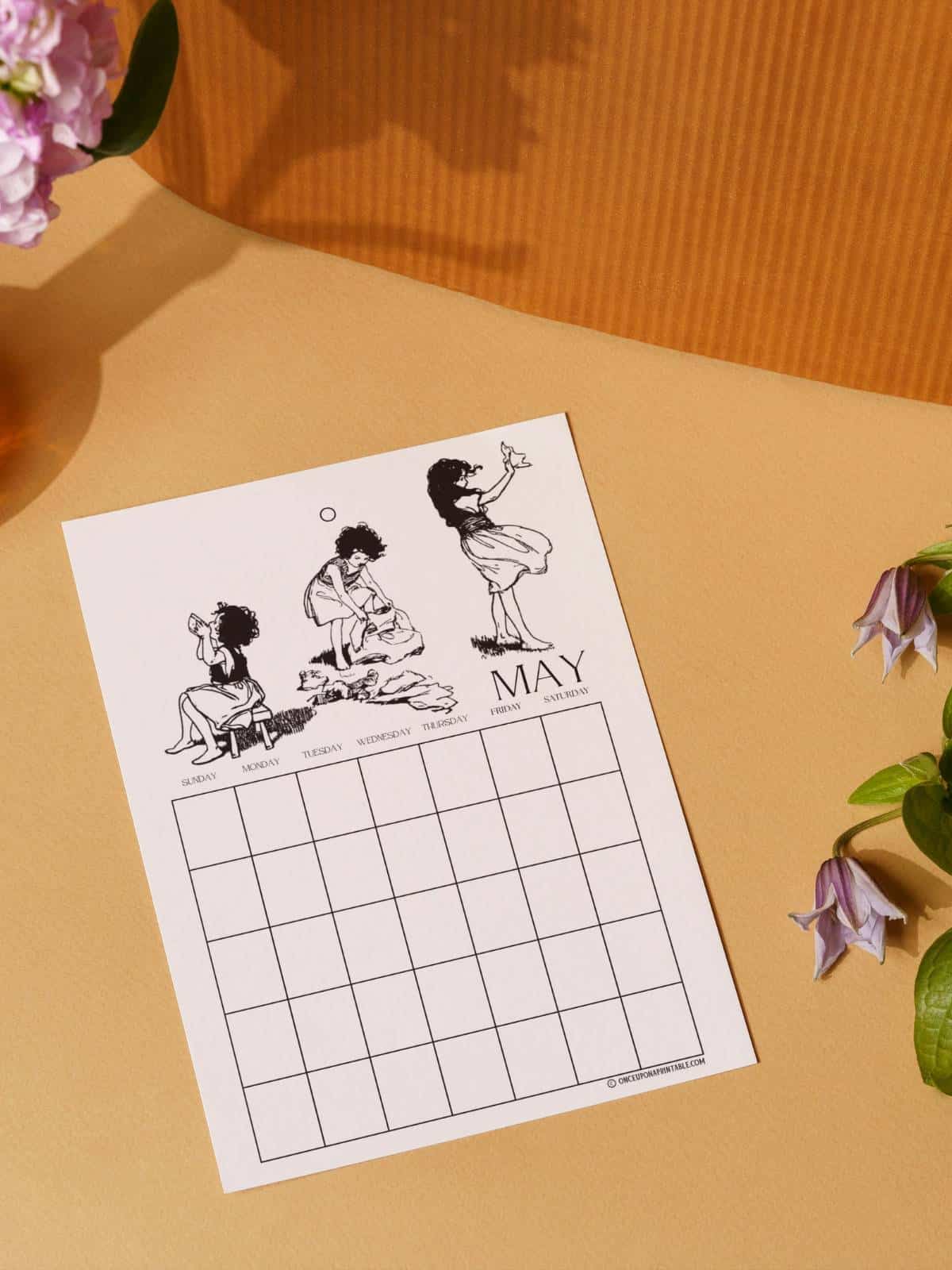 Heidi illustrated calendar pages by Jessie Willcox Smith sitting on an orange background with plants.