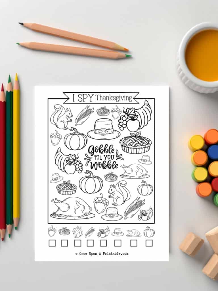 Thanksgiving i spy with "gobble til you wobble" in the center, coloring page.