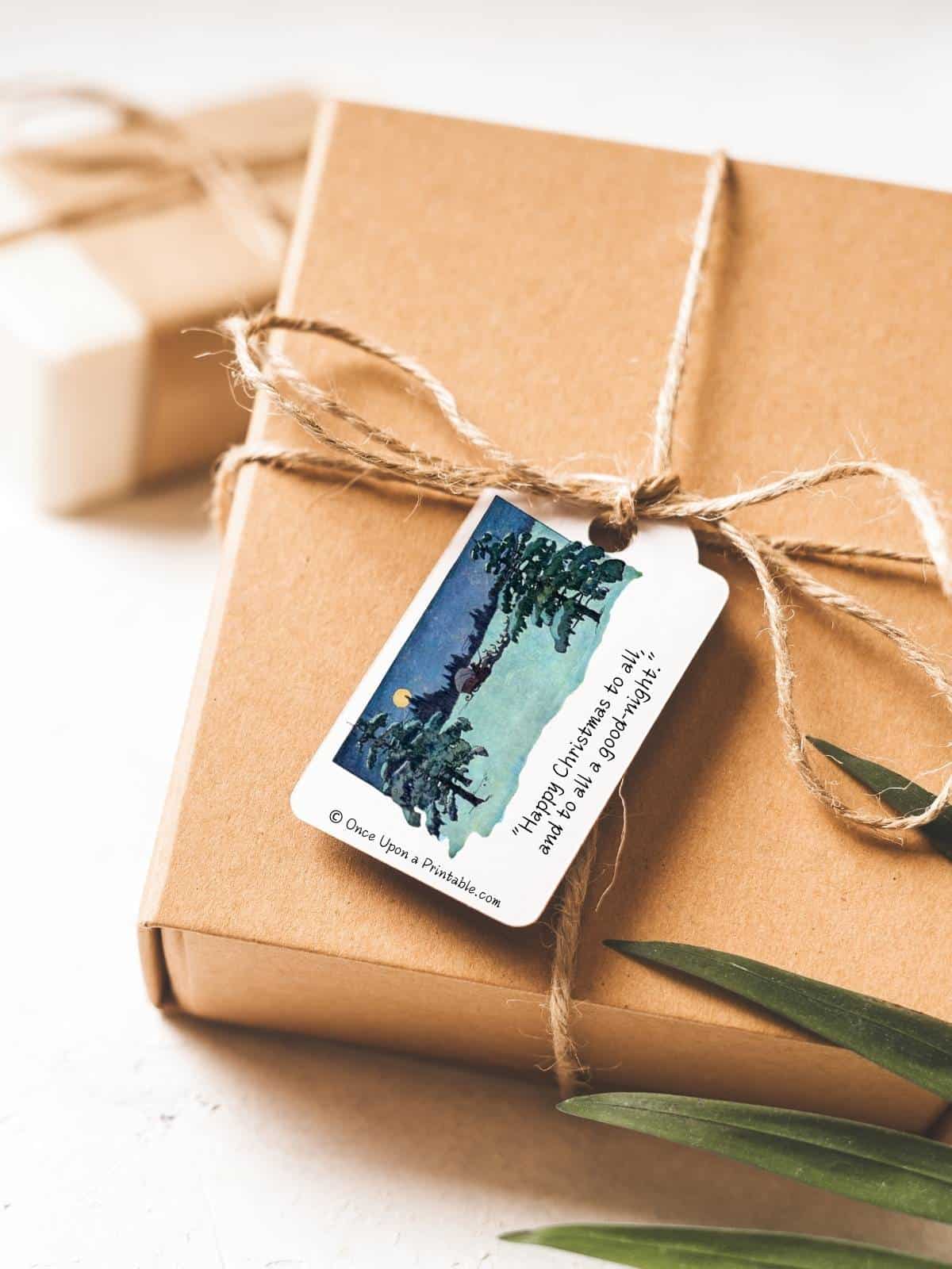 Simple vintage Christmas gift tags on brown paper wrapped boxes and red ribbon, adorned with a vintage illustration by Jessie Willcox Smith's version of Twas the night before Christmas story.