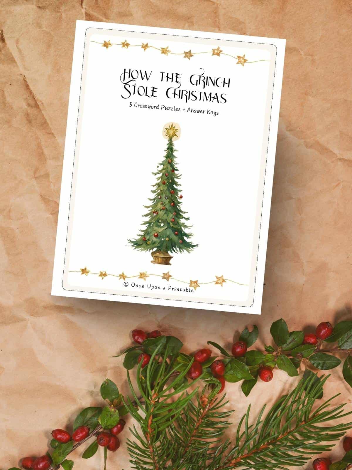 How the Grinch Stole Christmas crossword puzzles printable cover page with an illustrated christmas tree on a brown kraft paper background with holly garland.