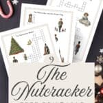 Nutcracker themed crossword puzzles with beautiful vibrant watercolor graphics printed and laying on a dark blue background with candy and cookies.