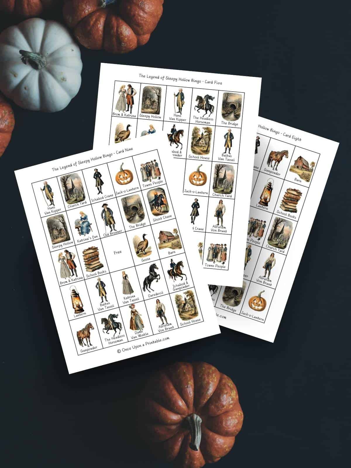 The Legend of Sleepy Hollow Bingo game printables on a black background with orange and green pumpkins.