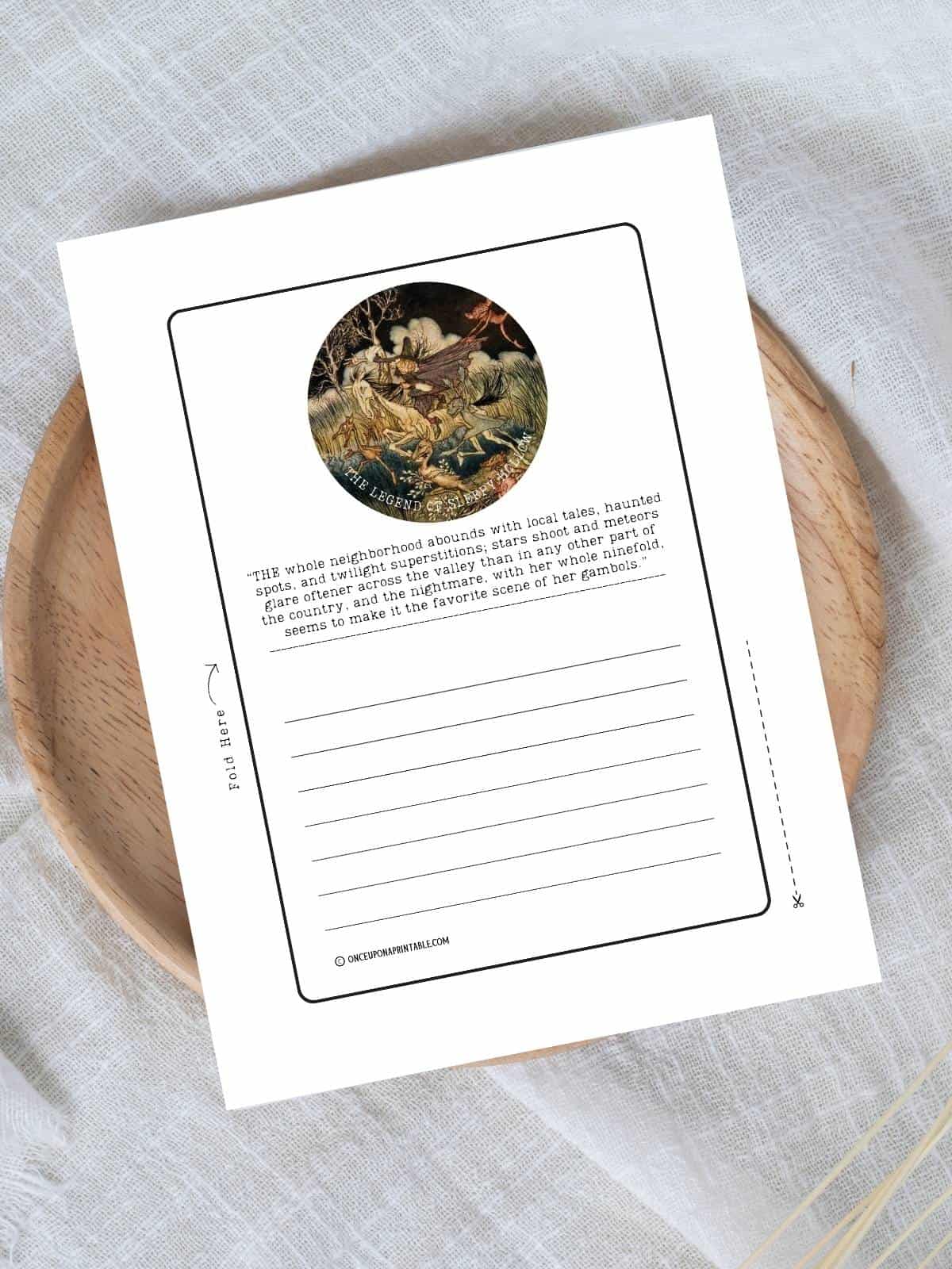 Nightmare and her whole ninefold illustration by Arthur Rackham on stationary from the book the legend of Sleepy Hollow. Printed out and displayed on a wooden lazy susan.