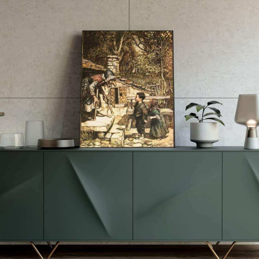 The brother's grimm "Hansel and Gretel" illustration by Arthur Rackham framed and displayed above a green console table.