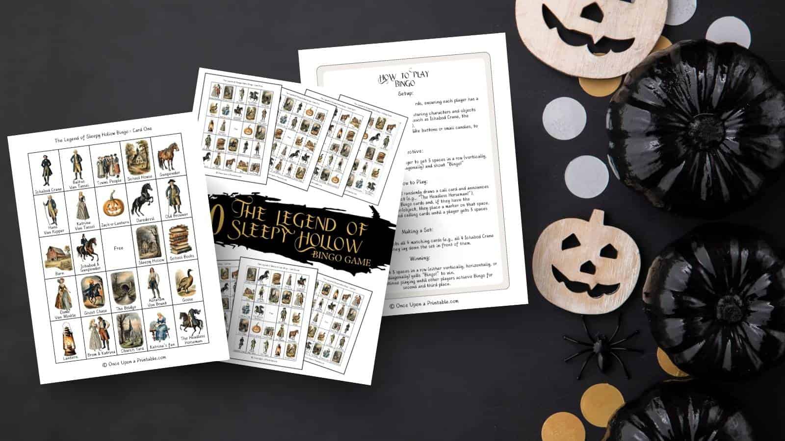 The Legend of Sleepy Hollow Bingo game printables on a black table with jack-o-lanterns and black pumpkins.