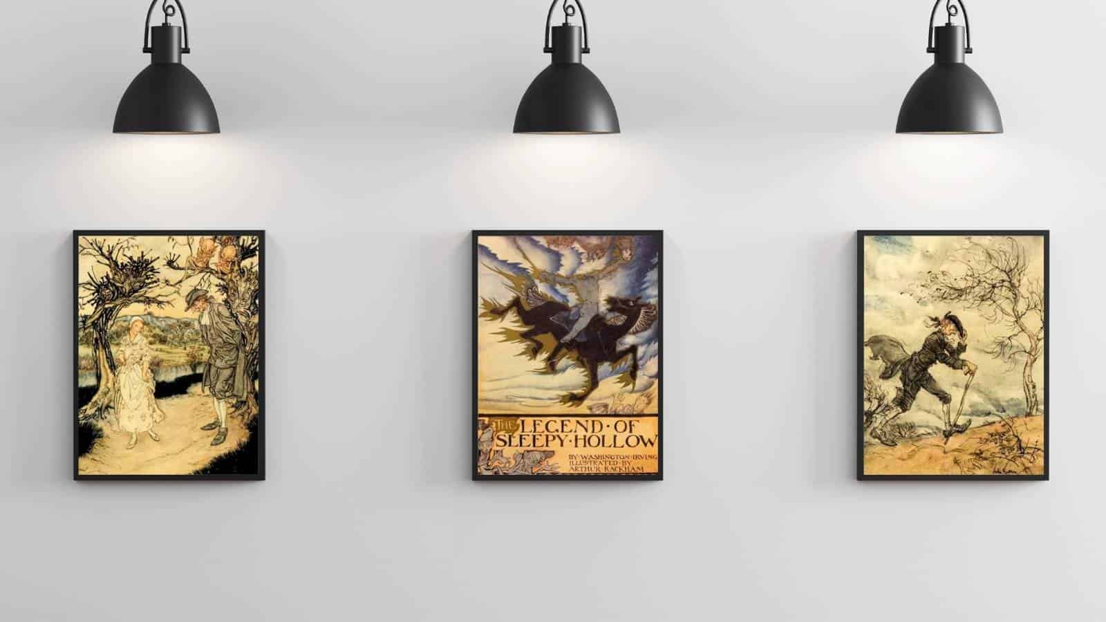 Three "Legend of Sleepy Hollow" illustrations framed and displayed below wall sconces.