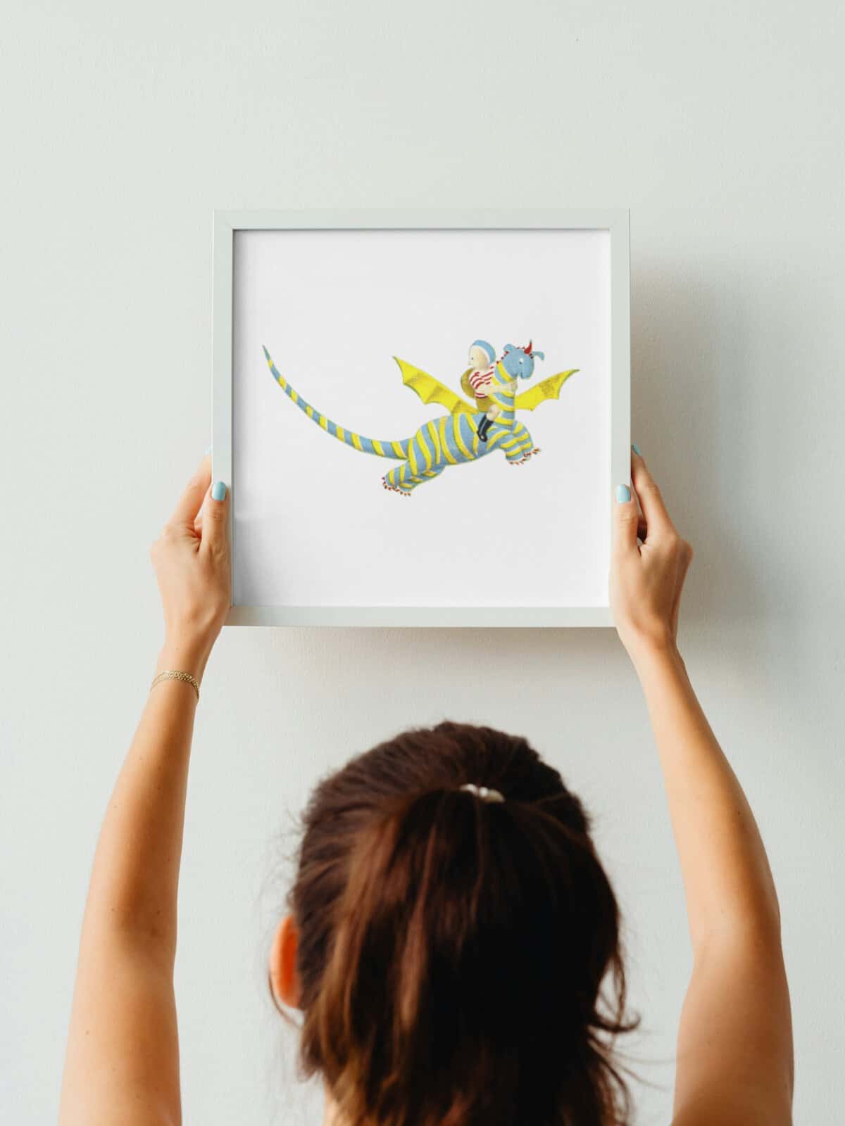 A colorful lithograph of Elmer riding his Dragon from my father's dragon.