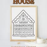Gingerbread house christmas coloring countdown page framed and displayed by a candle.