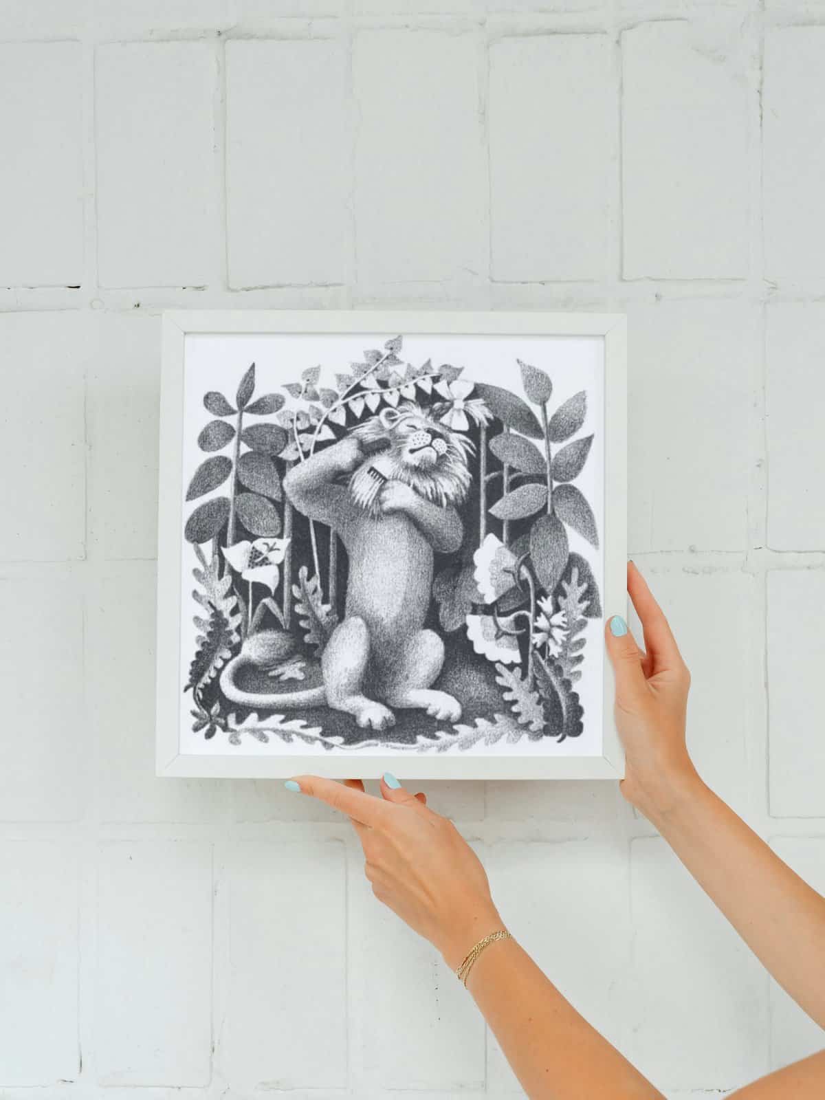 A lion combing through his mane with a brush, original black and white lithograph by Ruth Chrisman Gannett from the book My Father's Dragon.