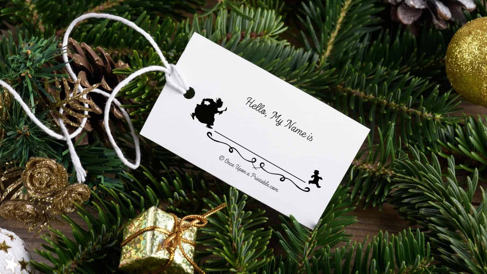 A tag of the little gingerbread man inside a christmas tree greenery.