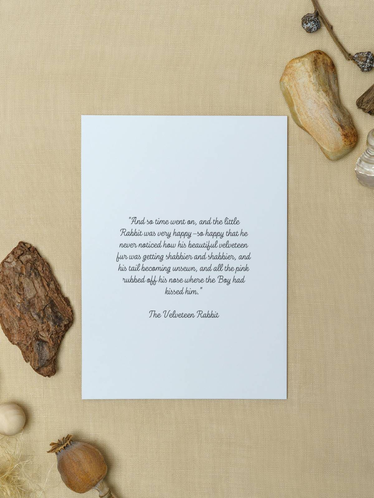 The inside of an illustrated Velveteen Rabbit note card in full color displayed with rocks.