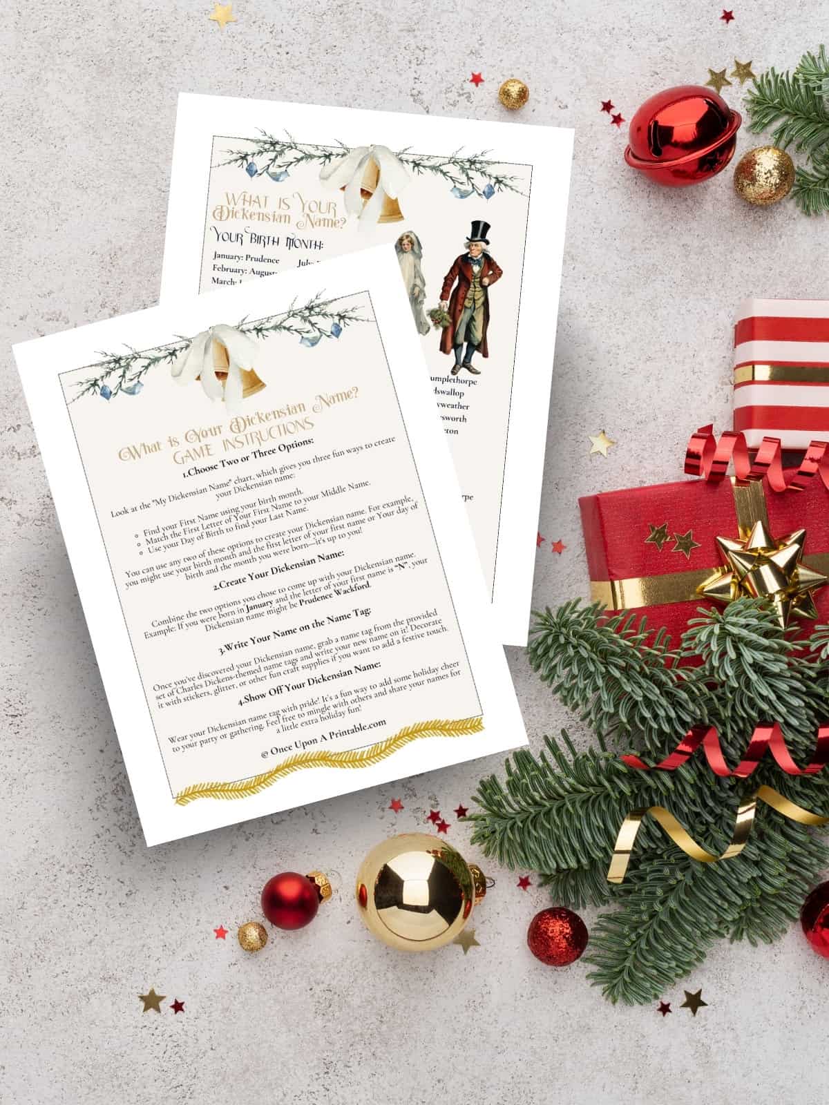 A Christmas Carol themed name game printables sitting on underneath a christmas tree.