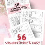 Kid's coloring bookmarks for Valentine's Day laying on a pink background with ribbons and baby's breath flowers.