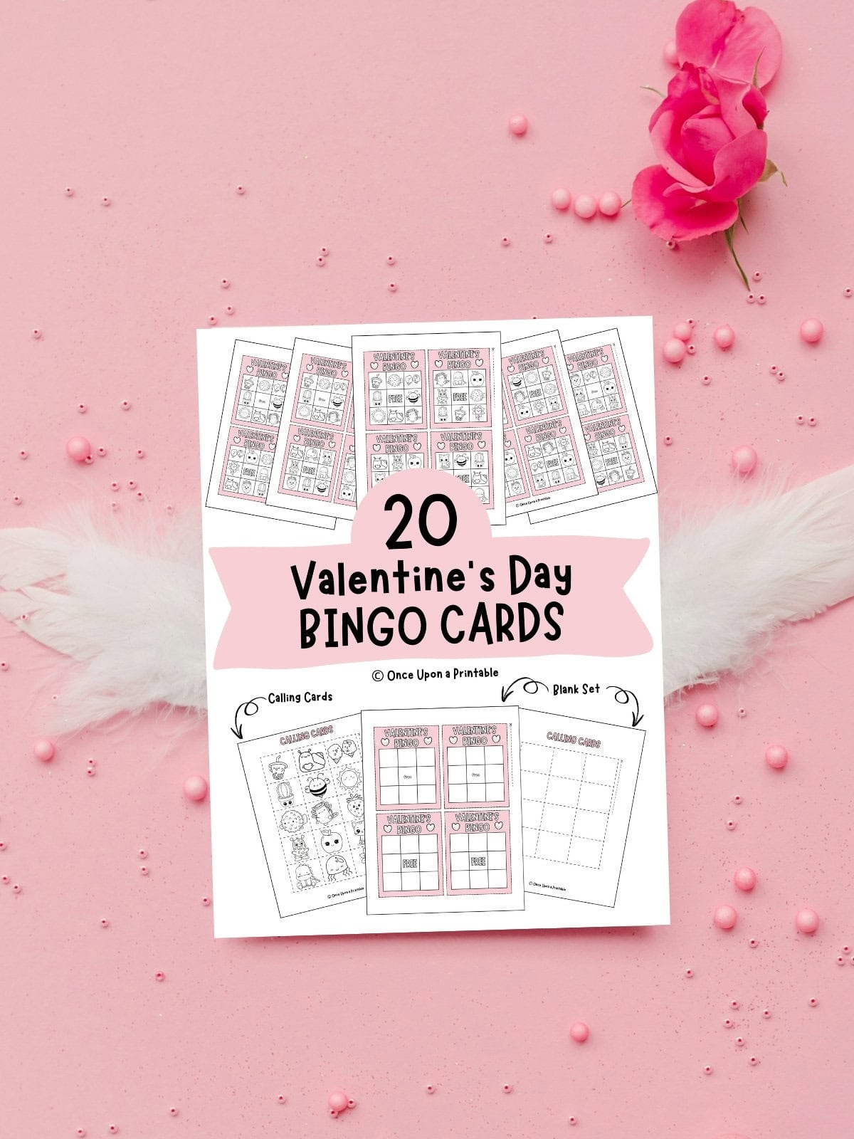 20 Valentine's day bingo card cover page laying on feathers on a pink background.