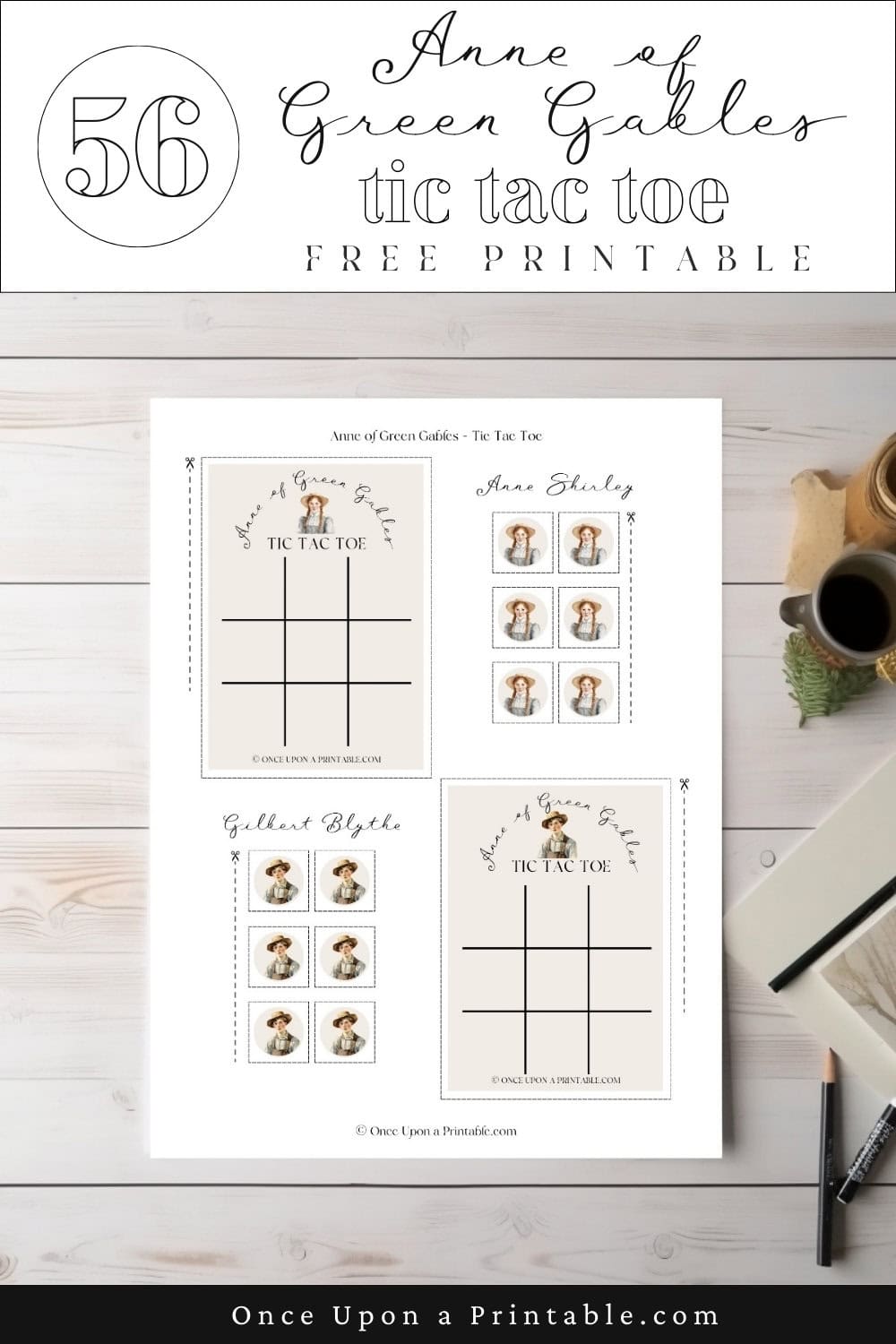 Anne of Green gables tic tac toe card with anne shirley and gilbert blythe, laying on a table with a pen and paper.