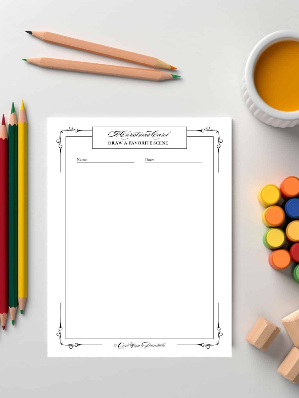 A Christmas Carol drawing page for a younger child with crayons and pencils and a paint cup.