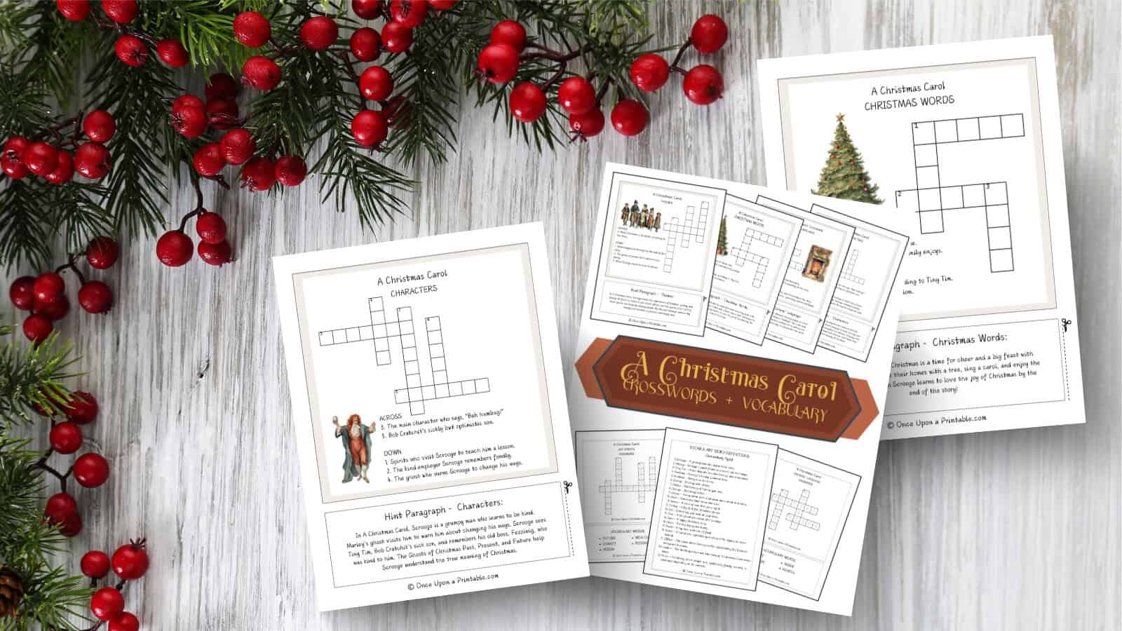 A Christmas Carol crossword puzzles with the cover page on a wooden background and garland with berries.
