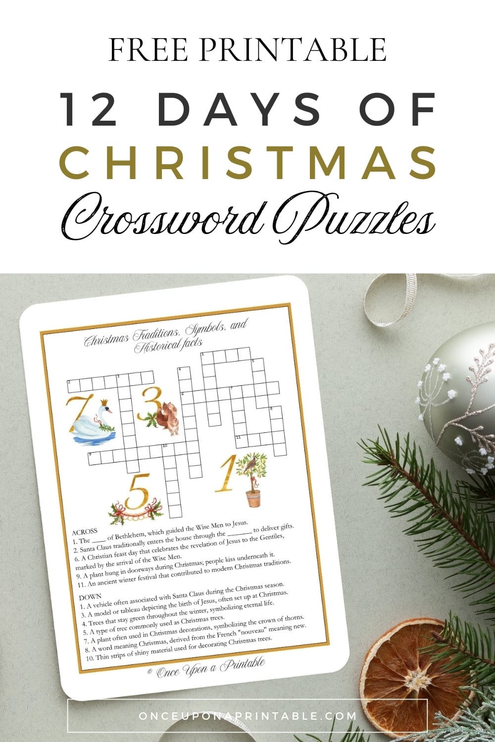 12 days of christmas illustrated crossword puzzle laying on a table with christmas garland, decorations, and dried oranges.
