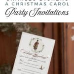 Classic "A christmas carol" party invitation being hold by a woman's hand in front of a solid wood door.