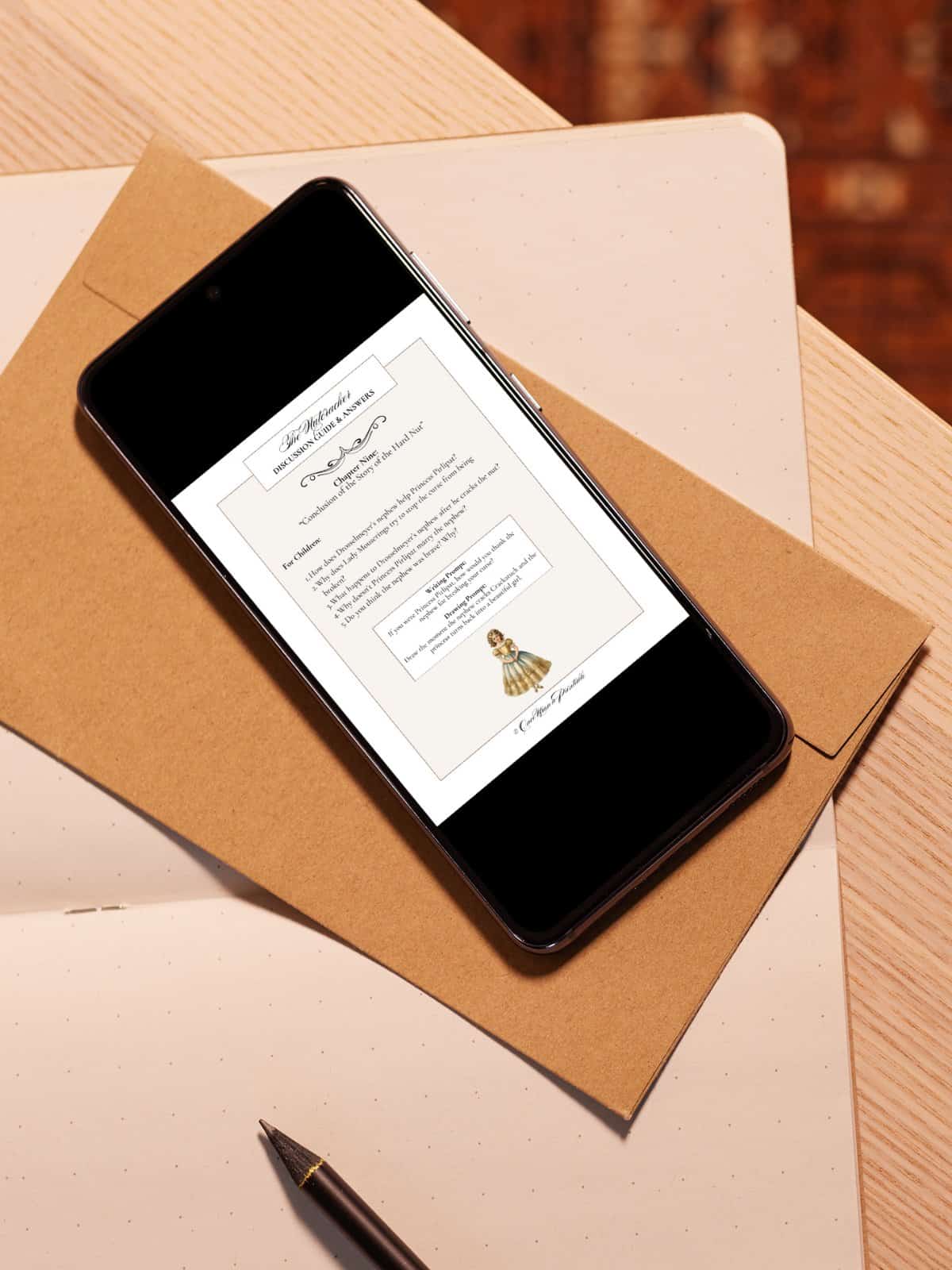 Read aloud discussion guide on a phone laying on an envelope.