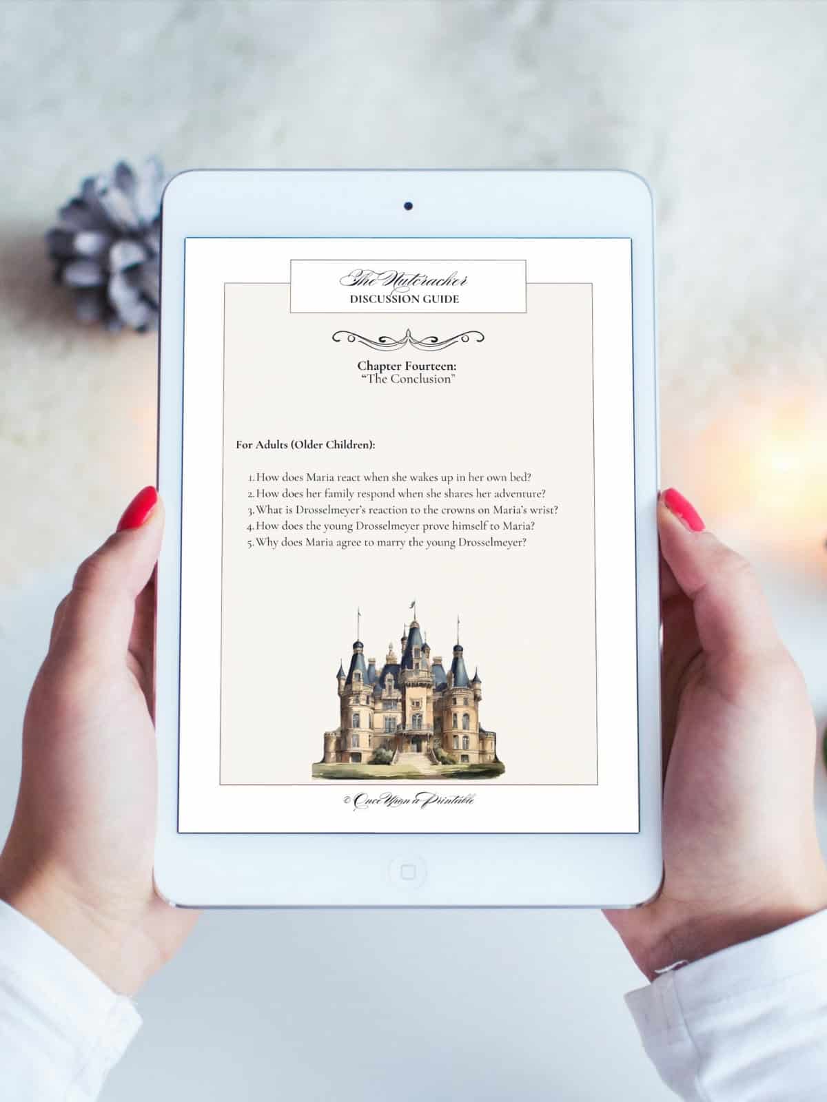 The Nutcracker guide on a tablet held by a woman's hands.