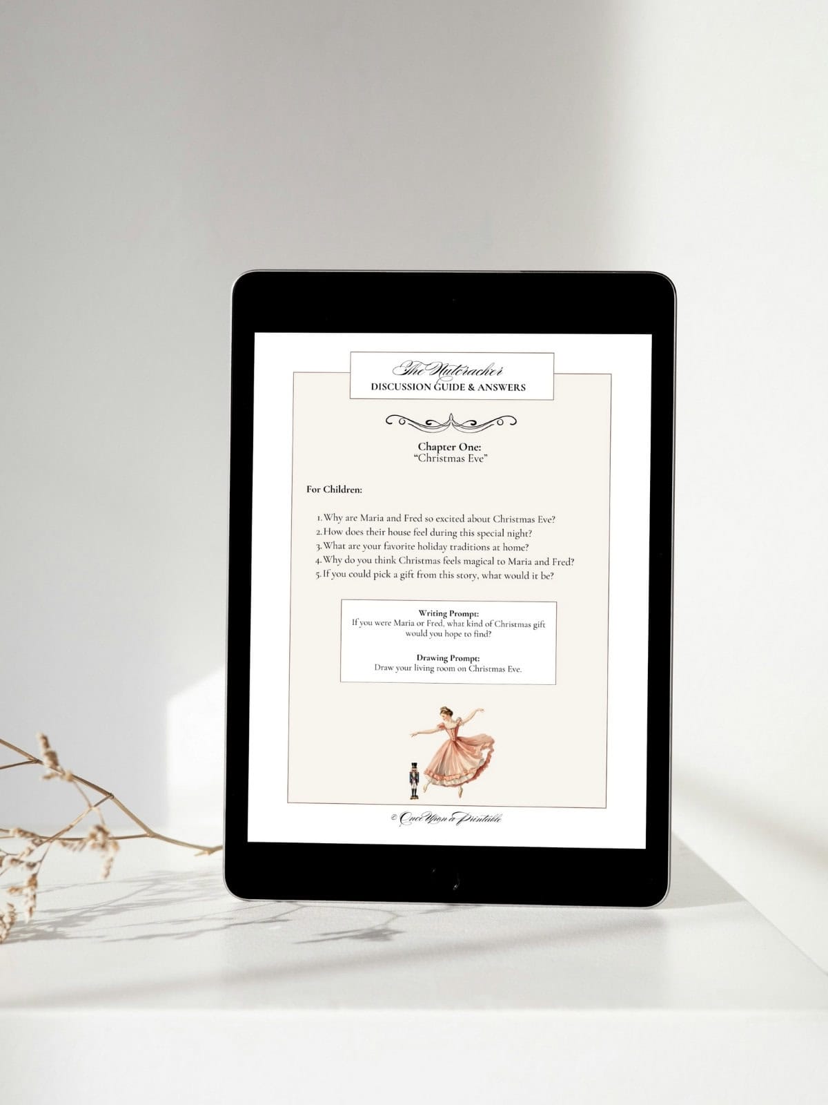 The Nutcracker podcast read-aloud companion for chapter one, children's version displayed on a tablet on a countertop.