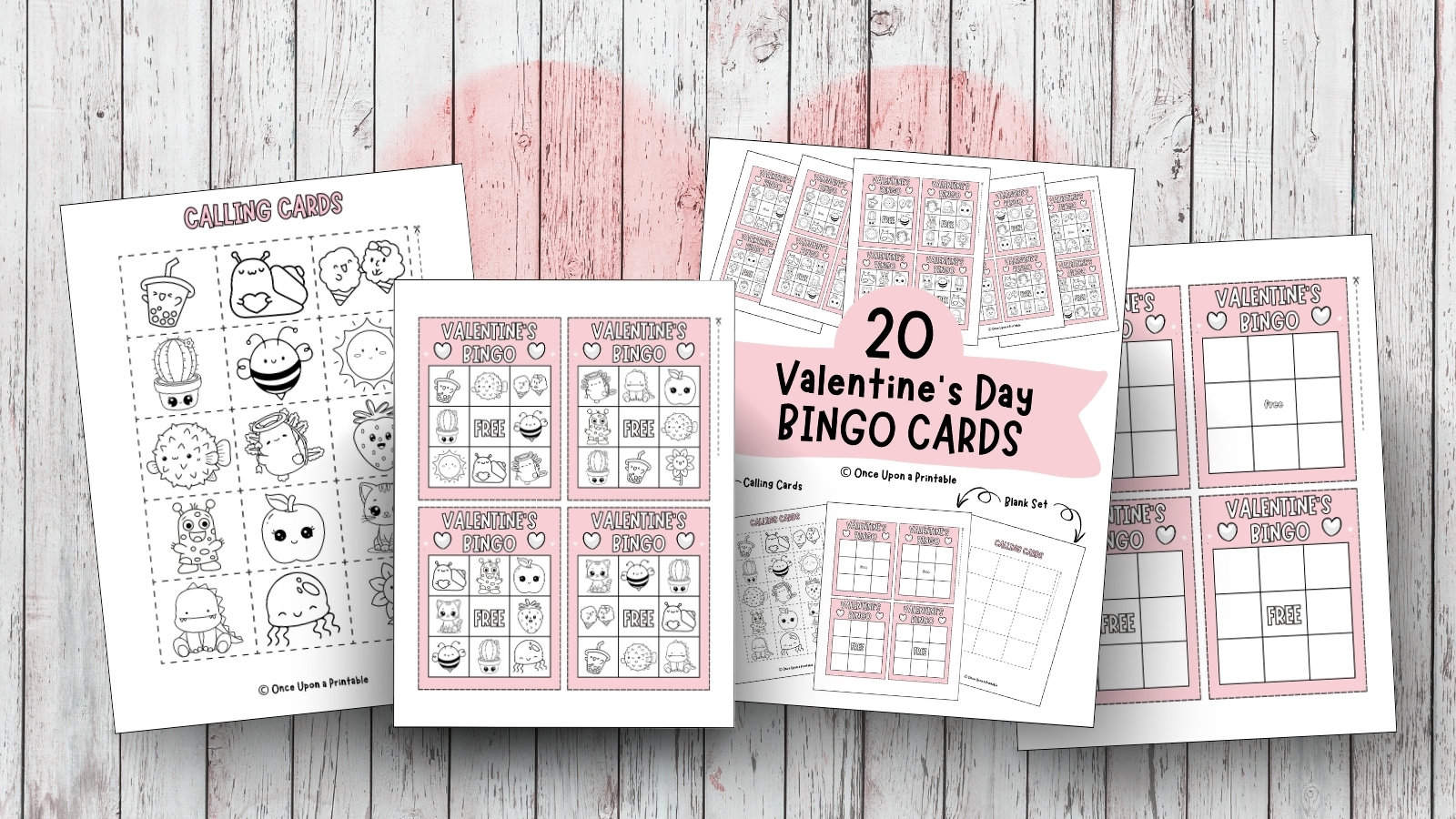 Valentine's Day Bingo cards for coloring with calling cards that match laying ona wooden surface with pink hearts.