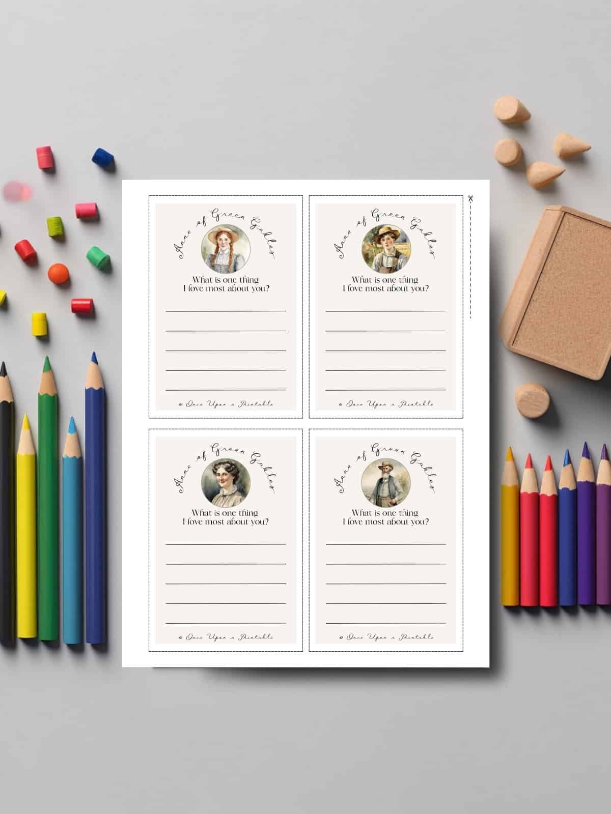 Anne of Green gables printable friendship cards laying with coloring pencils on a table top.