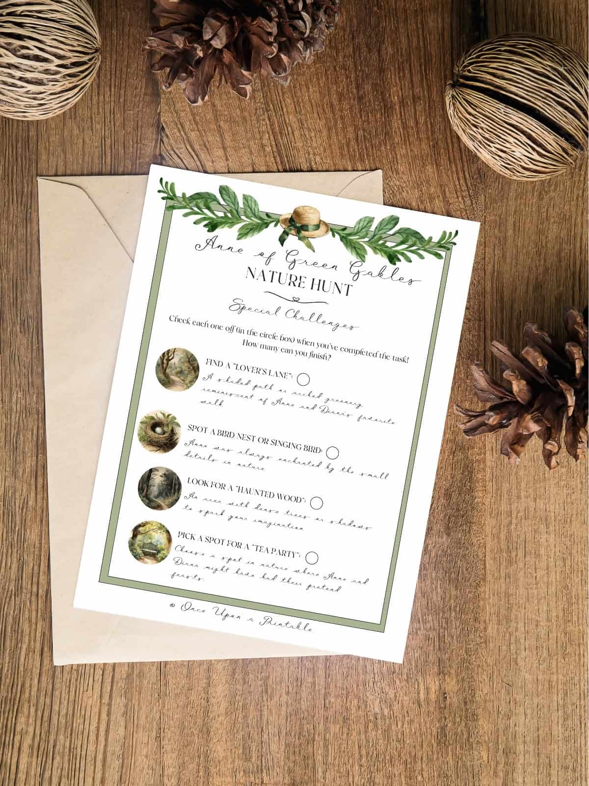 Anne of Green Gables special challenges hunt add on laying on a wooden floor with pinecones.