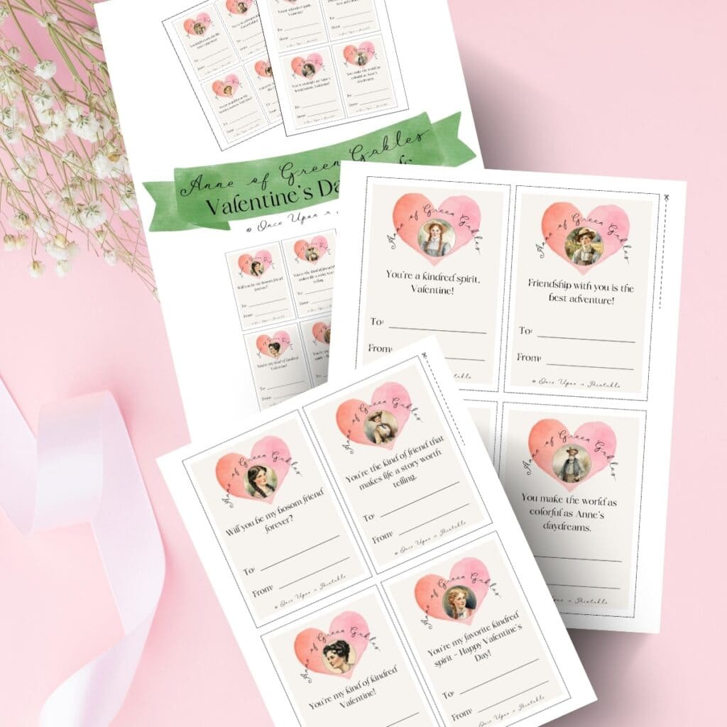 Anne of Green Gables Valentine's day cards featuring characters from the story, laying on a pink background with baby's breath flowers and ribbon.