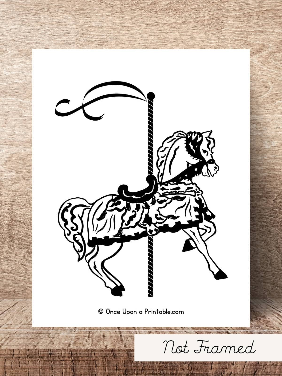 At the zoo carousel horse coloring page unframed laying on a wooden table.