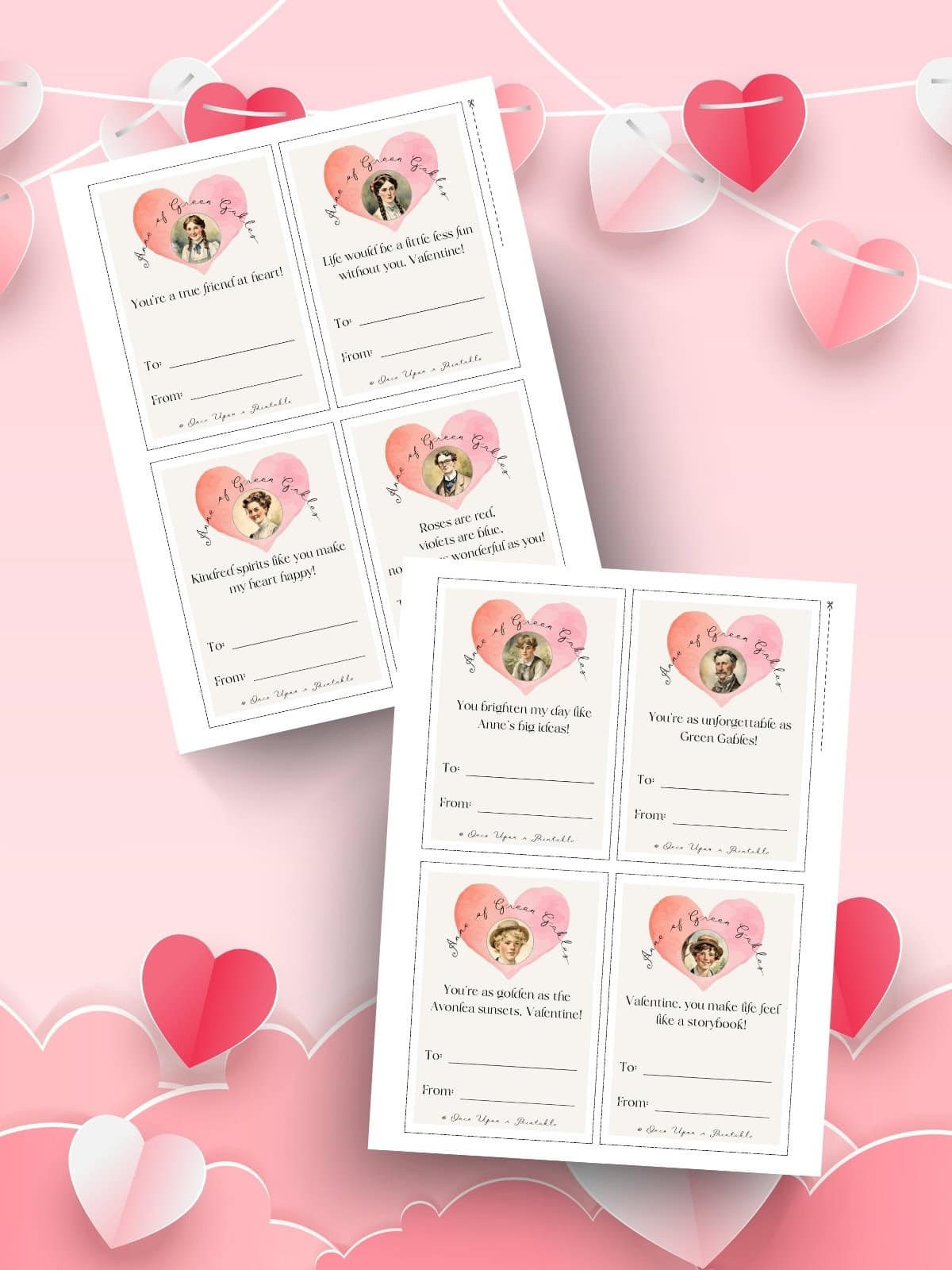 Avonlea inspired valentine's day cards laying on a pink background with pink and red hearts.