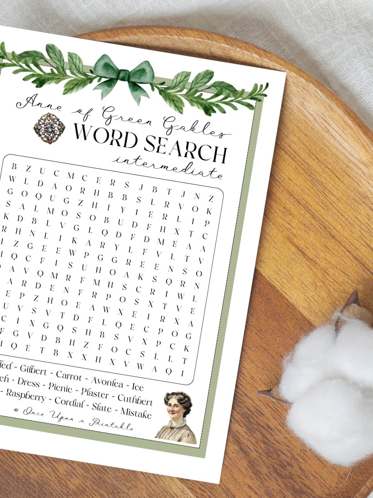 Intermediate crossword puzzle with marilla cuthbert and her brooch laying on a wooden lazy Susan.