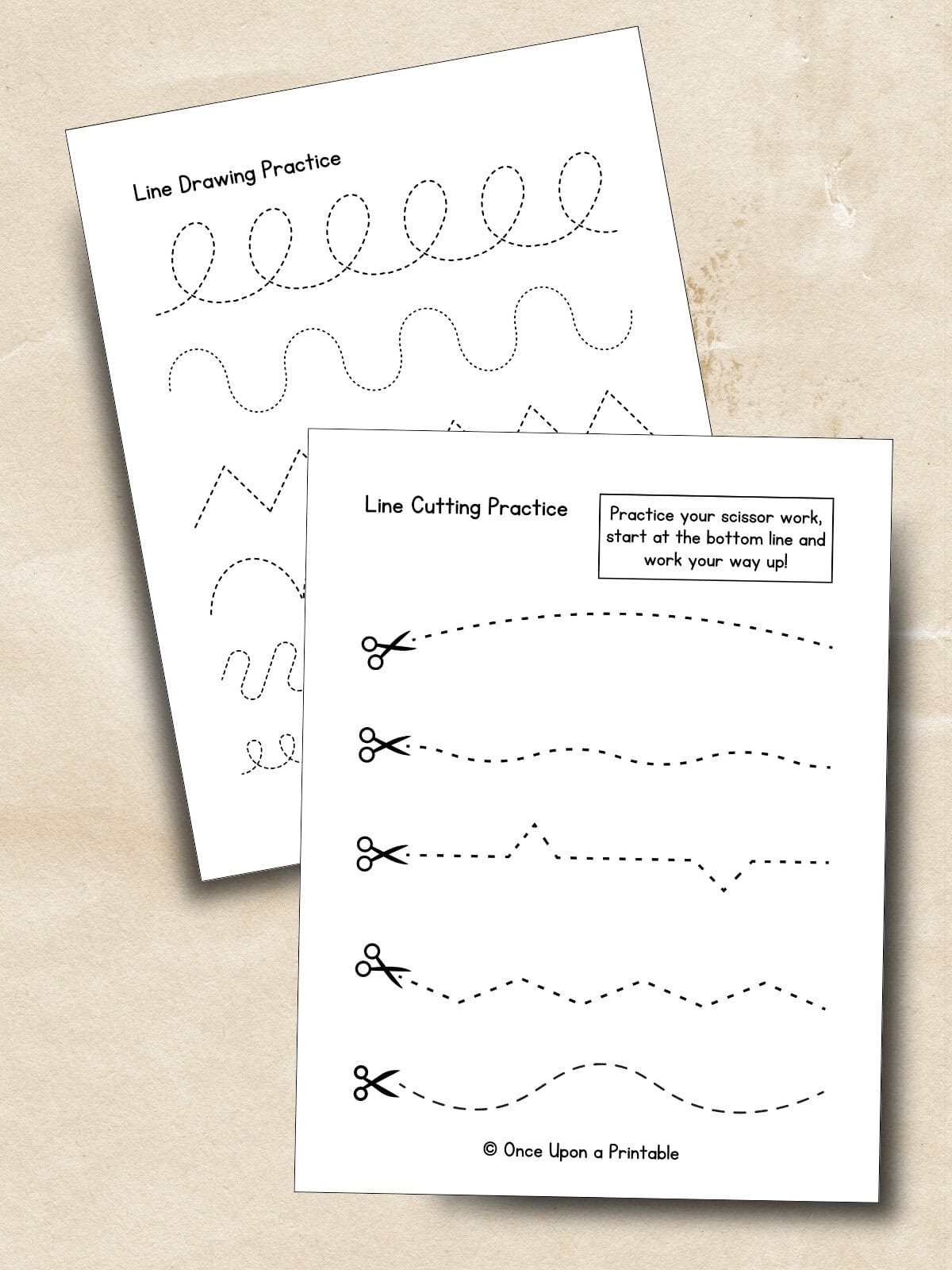 Line drawing and cutting practice for kids laying on a creamy background.