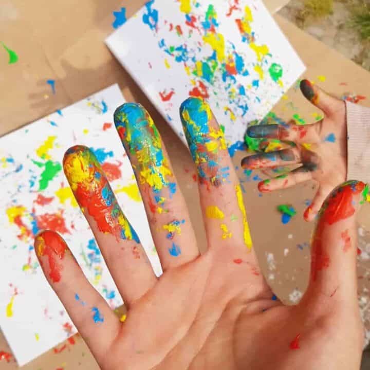 Easter painting activity with plastic eggs.