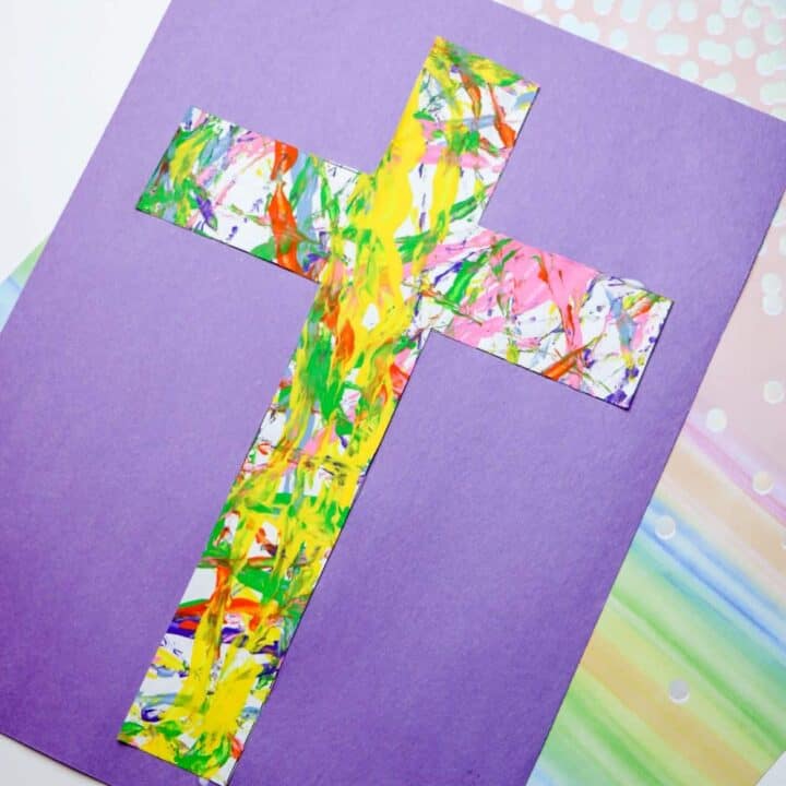 Cross marble painting activity.
