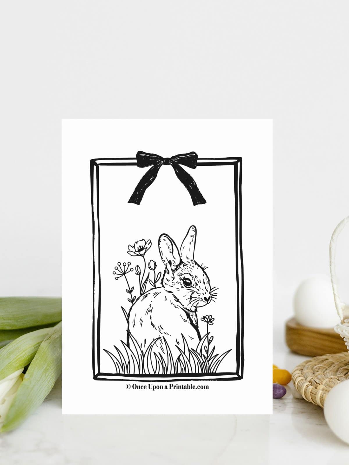Little baby bunny with flowers coloring page for Easter.