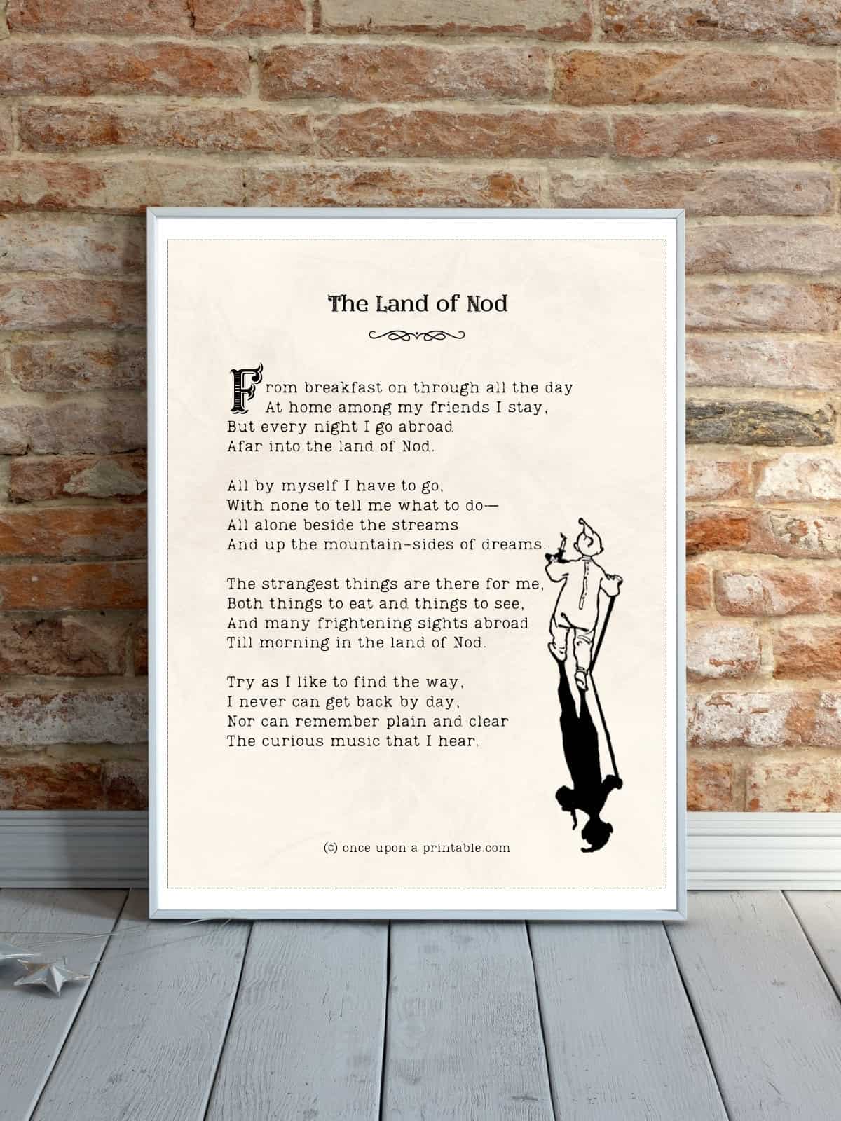 The Child's garden of verses poem "Land of Nod" with original black and white illustration by Jesse willcox smith framed leaning up against a brick wall.