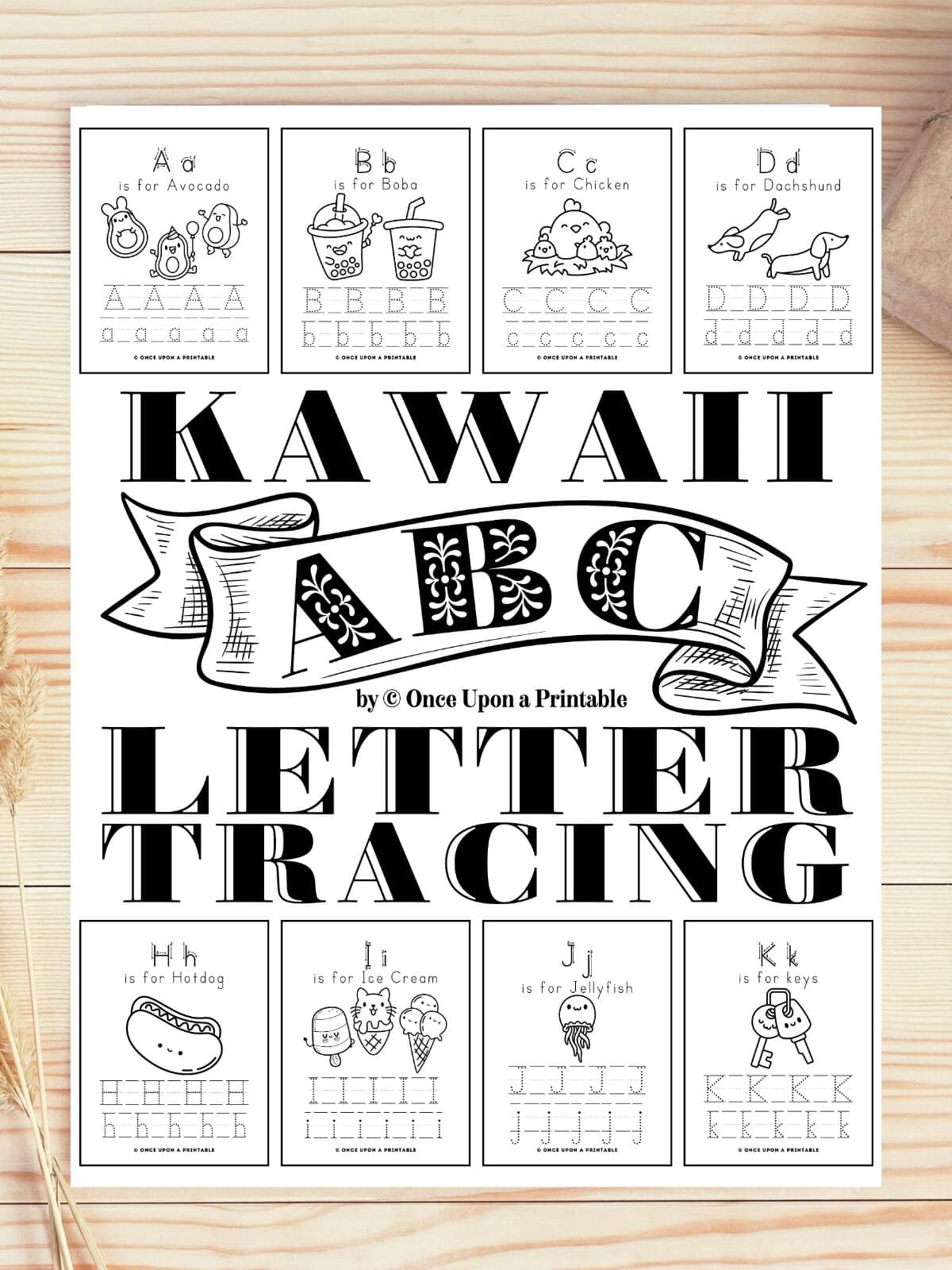 Kawaii graphics on a page with letter tracing and coloring pages. 