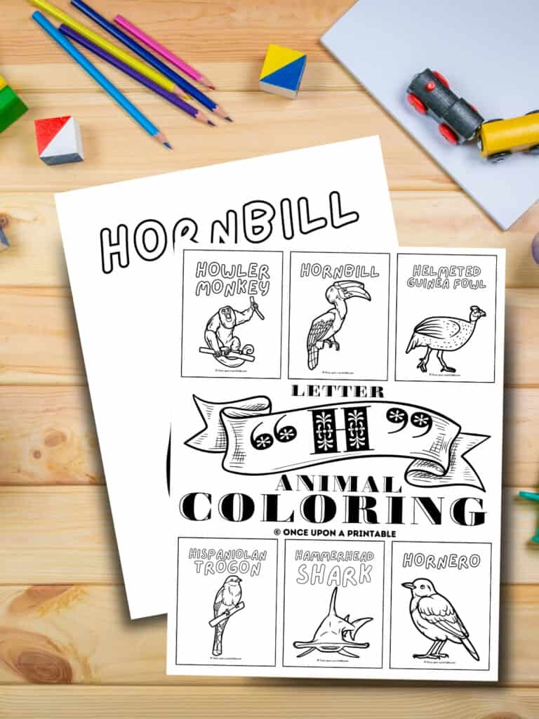 Letter H animal coloring pages cover page laying on a table with coloring pencils.