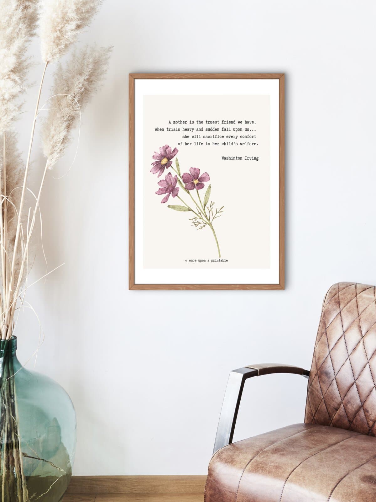 Washington Irving quote with floral watercolor illustrations framed on the wall. 
