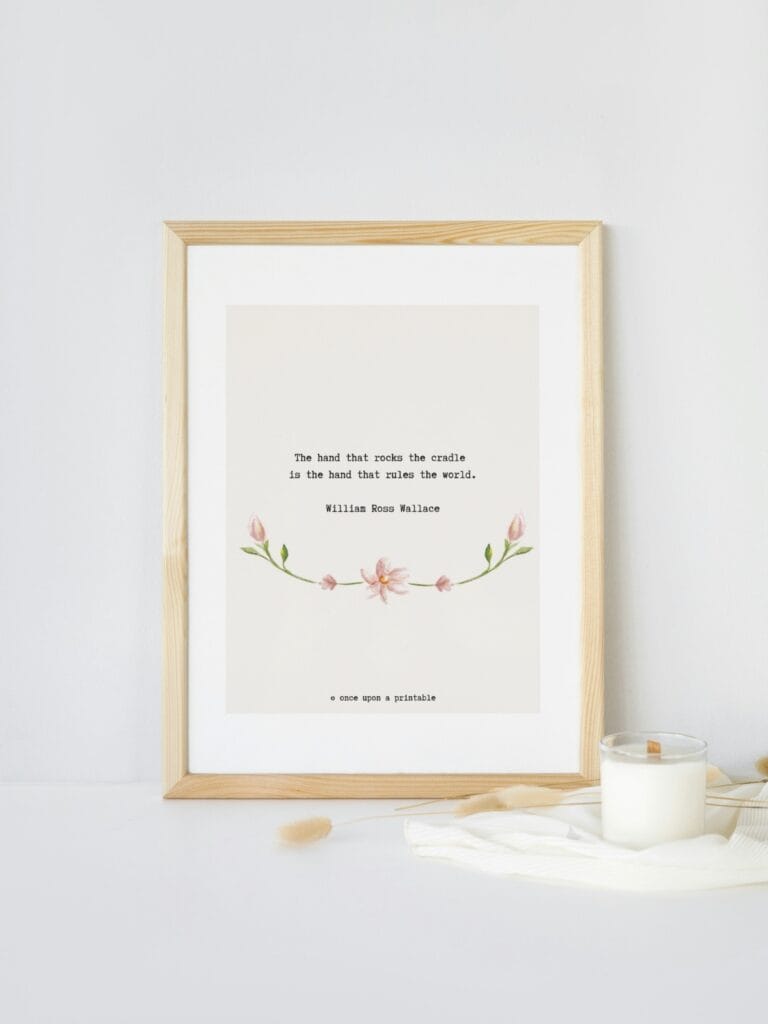 William Ross Wallace quote with watercolor flowers framed on display.