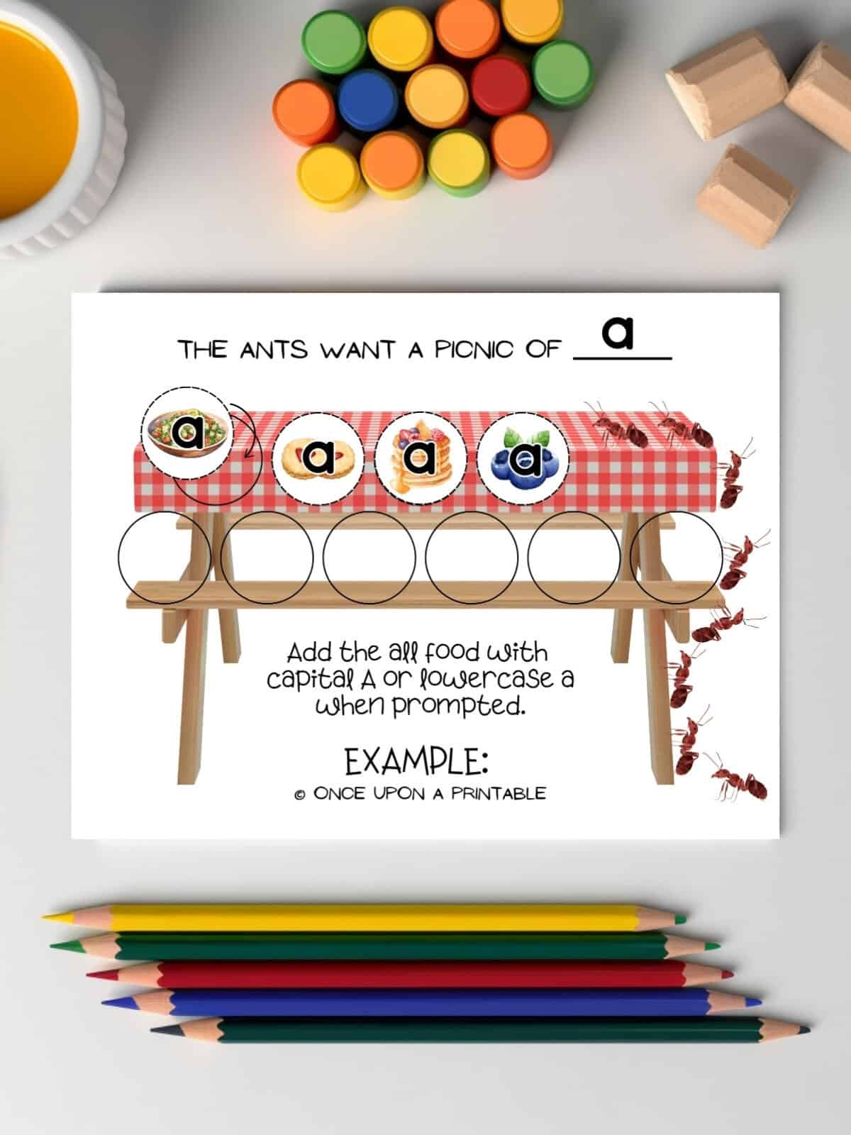 The Ants picnic game boa
rd with lowercase a game pieces for example. 