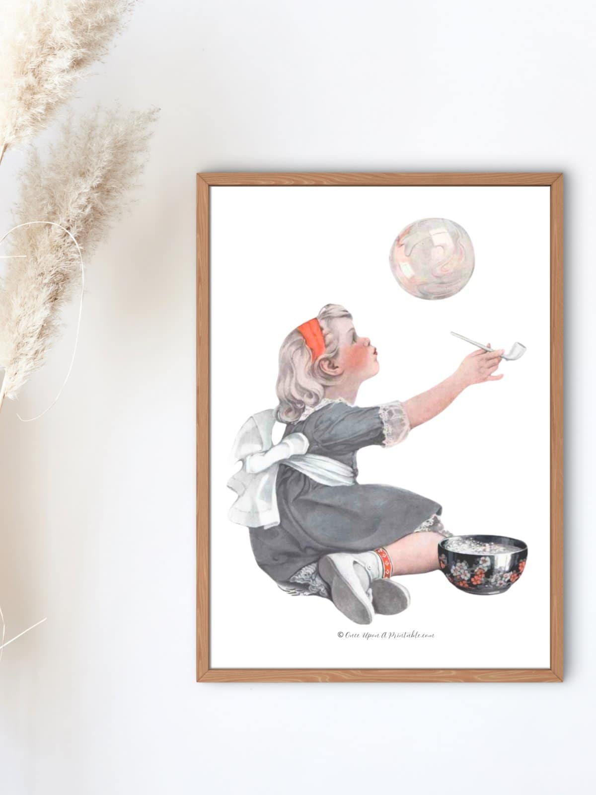 Girl blowing bubbles spring art print framed on a wall. 