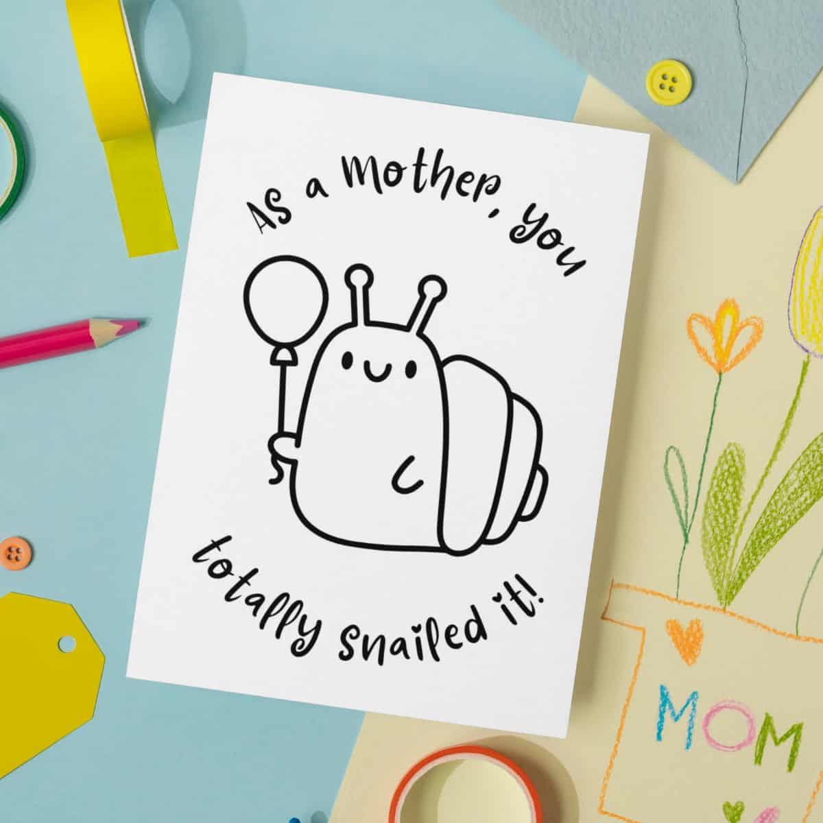 Snailed it Mother's day card for kids to color, laying on a blue background.
