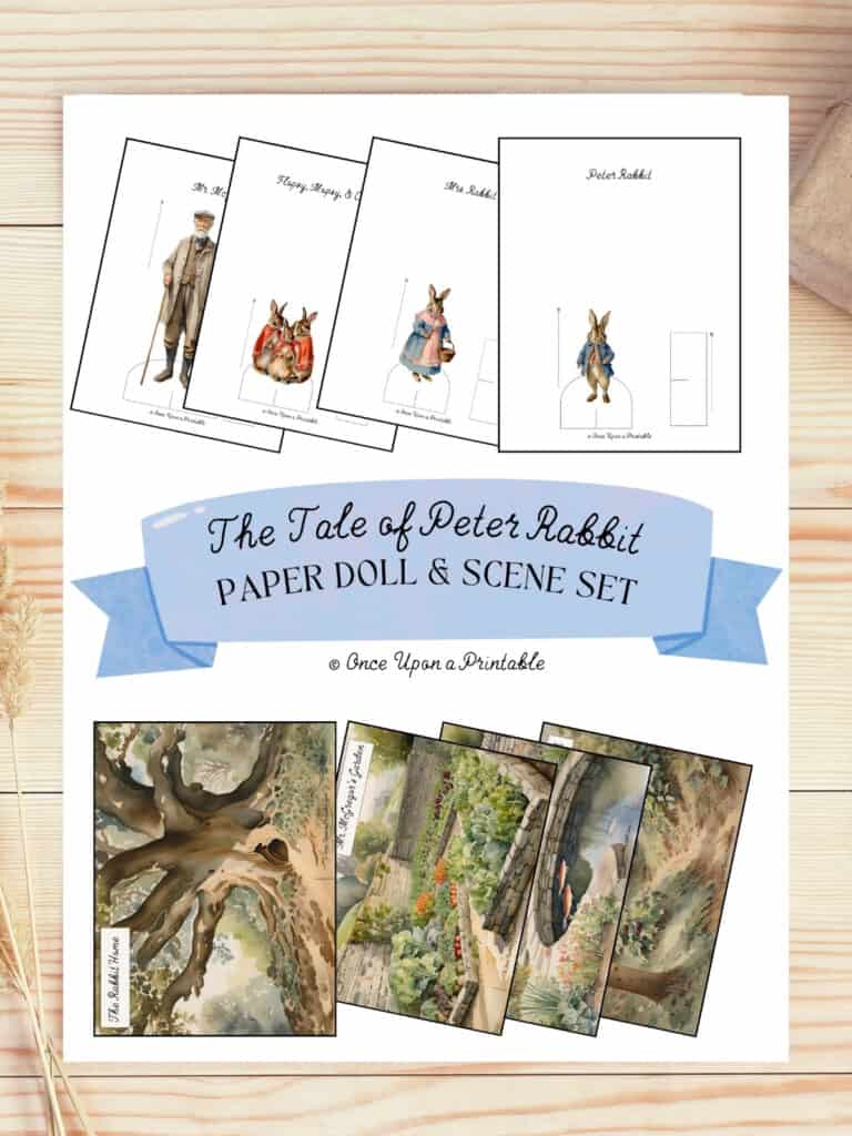 Peter Rabbit paper doll set cover page laying on a wooden table. 