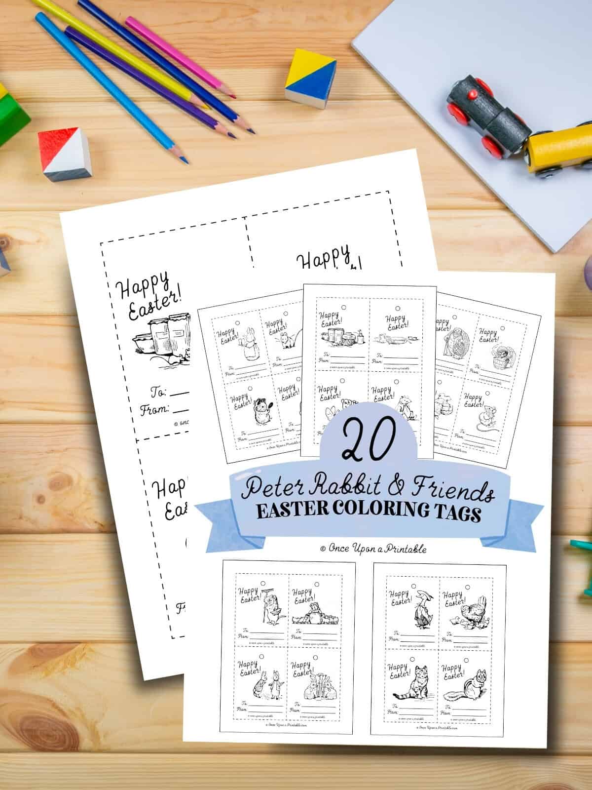 Peter Rabbit and Friends coloring cards and gift tags for Easter laying on a wooden table top.