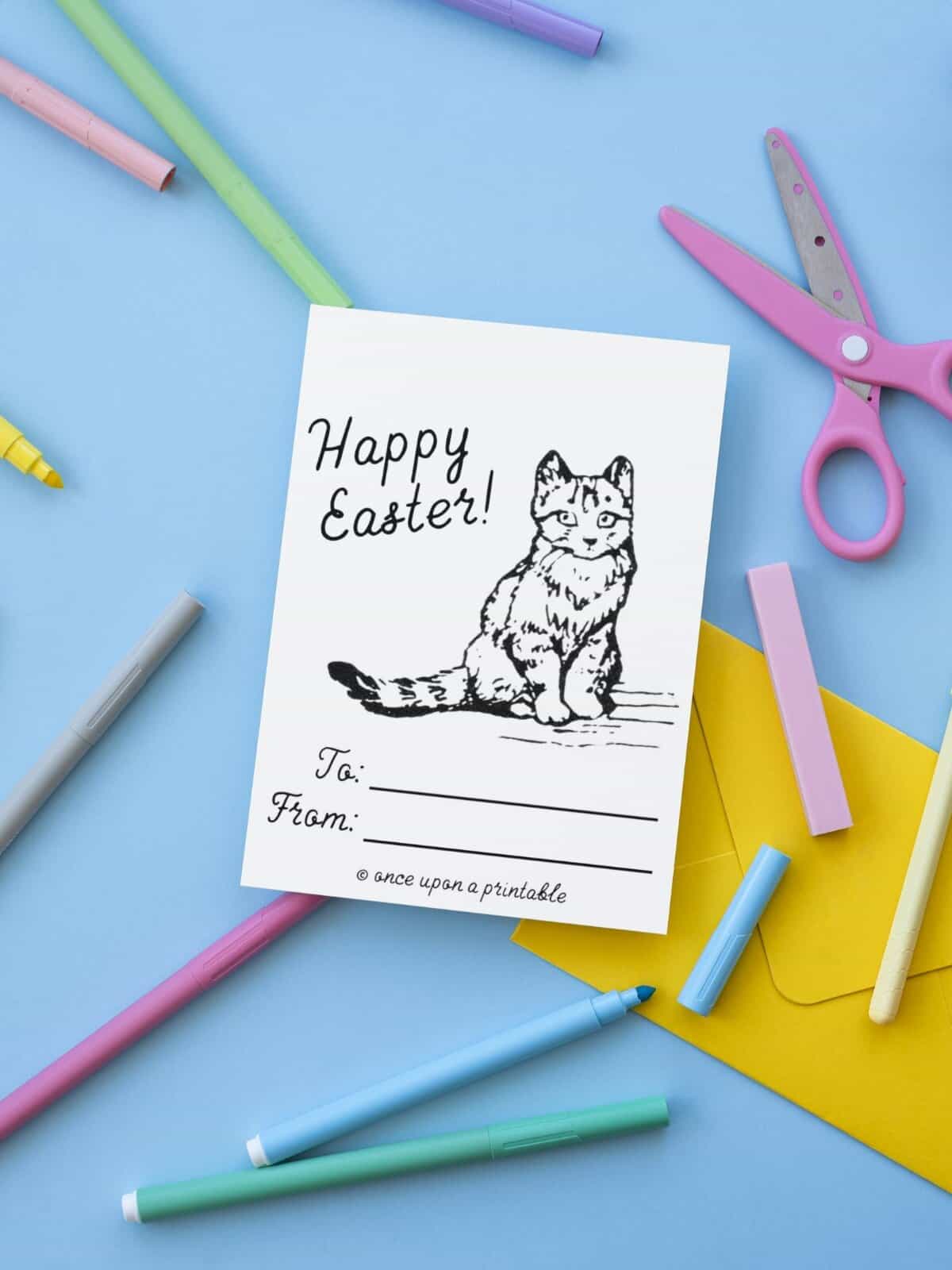 Miss Moppet Happy Easter coloring card on a blue background. 